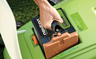 Lift-out battery on a Neuton Lawn Mower